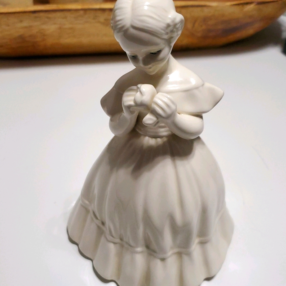 Porcelain figurine of a young woman